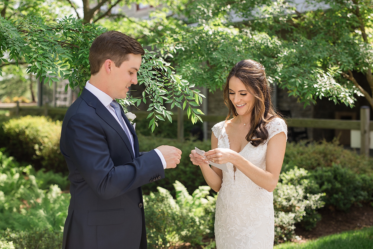 bride and. groom read private vows