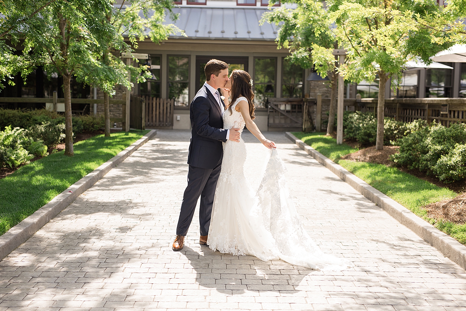 bride and groom kiss