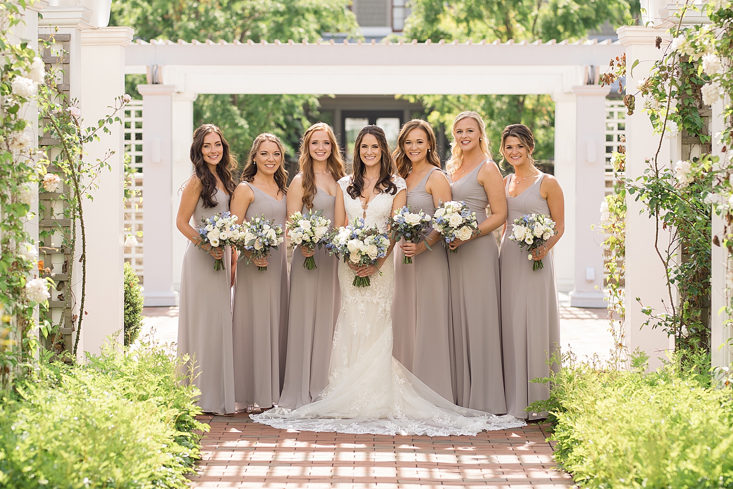 bridesmaids under trellis