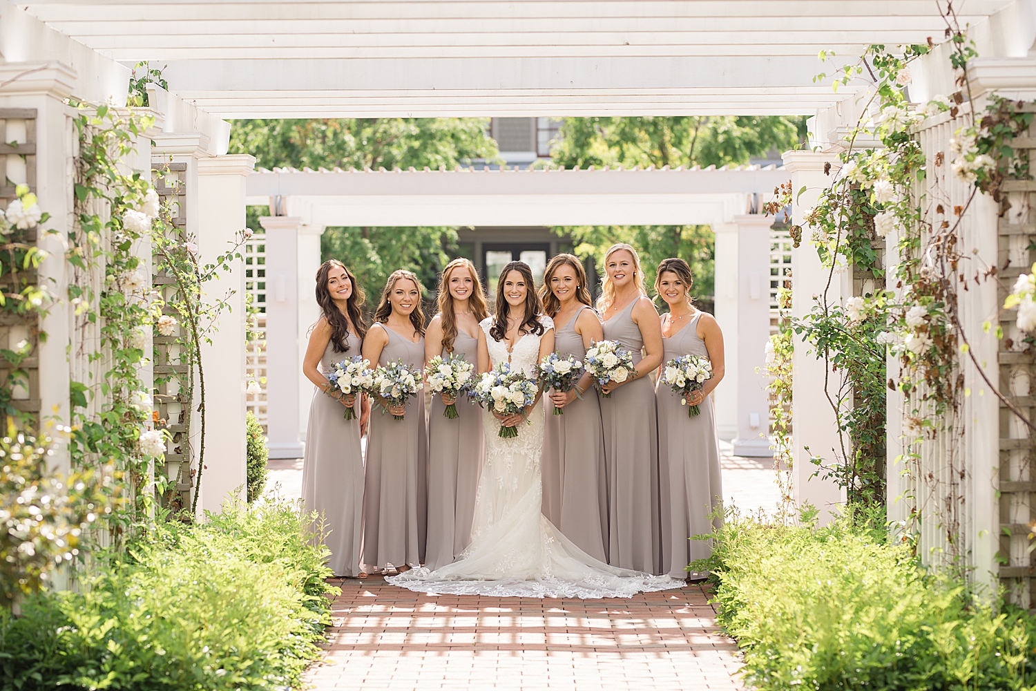 bridesmaids under trellis