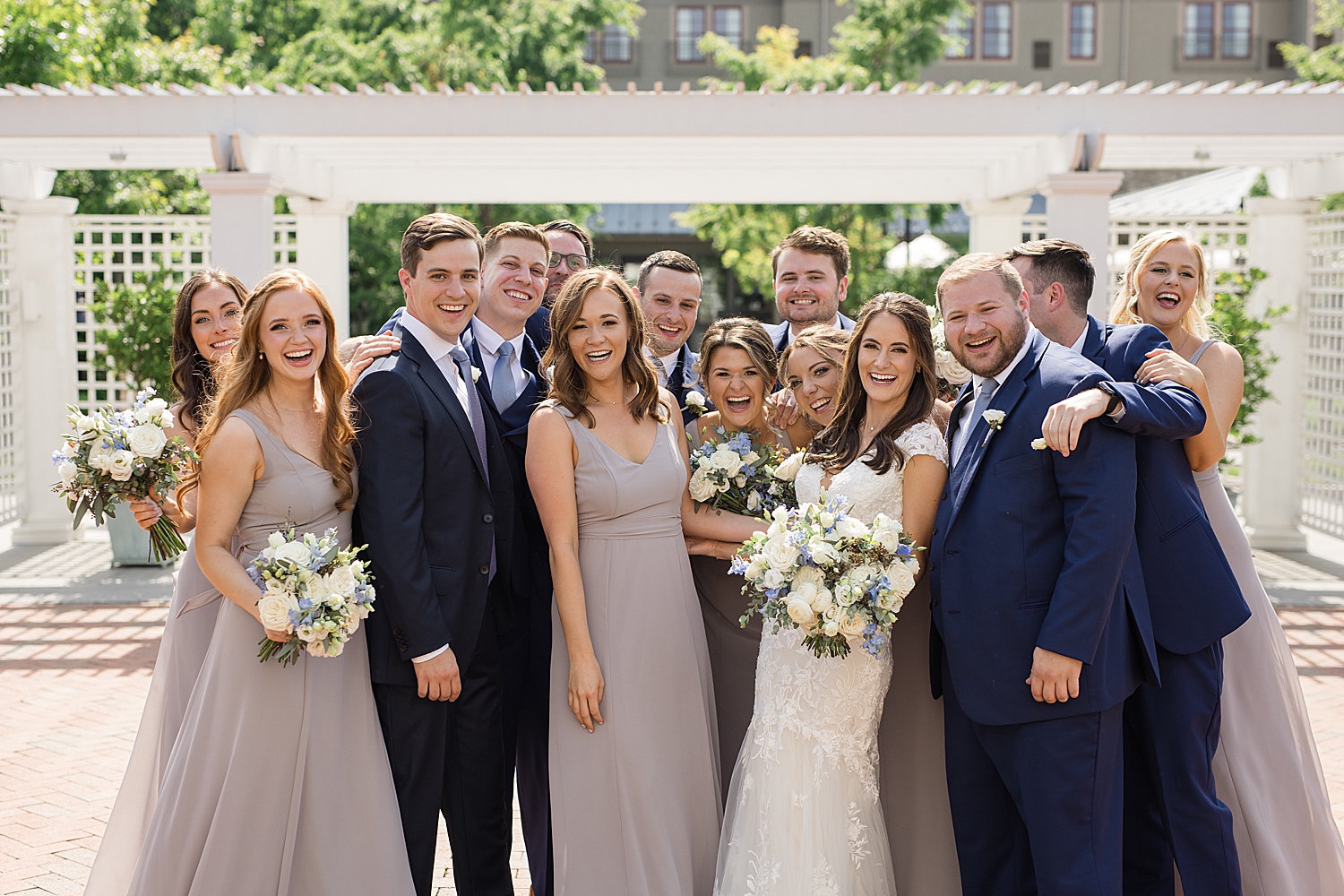 wedding party celebrates with newlyweds