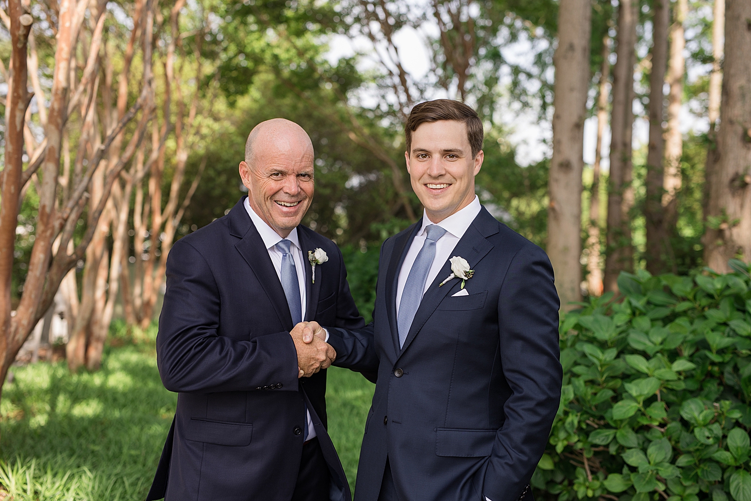 groom handshake with dad