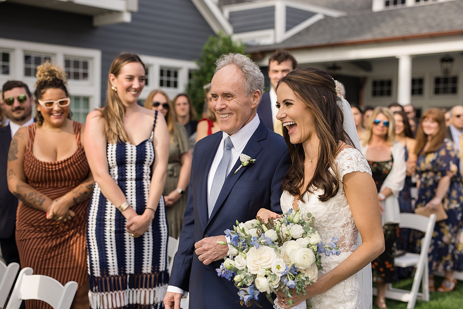 bride and her dad walking down the aisle