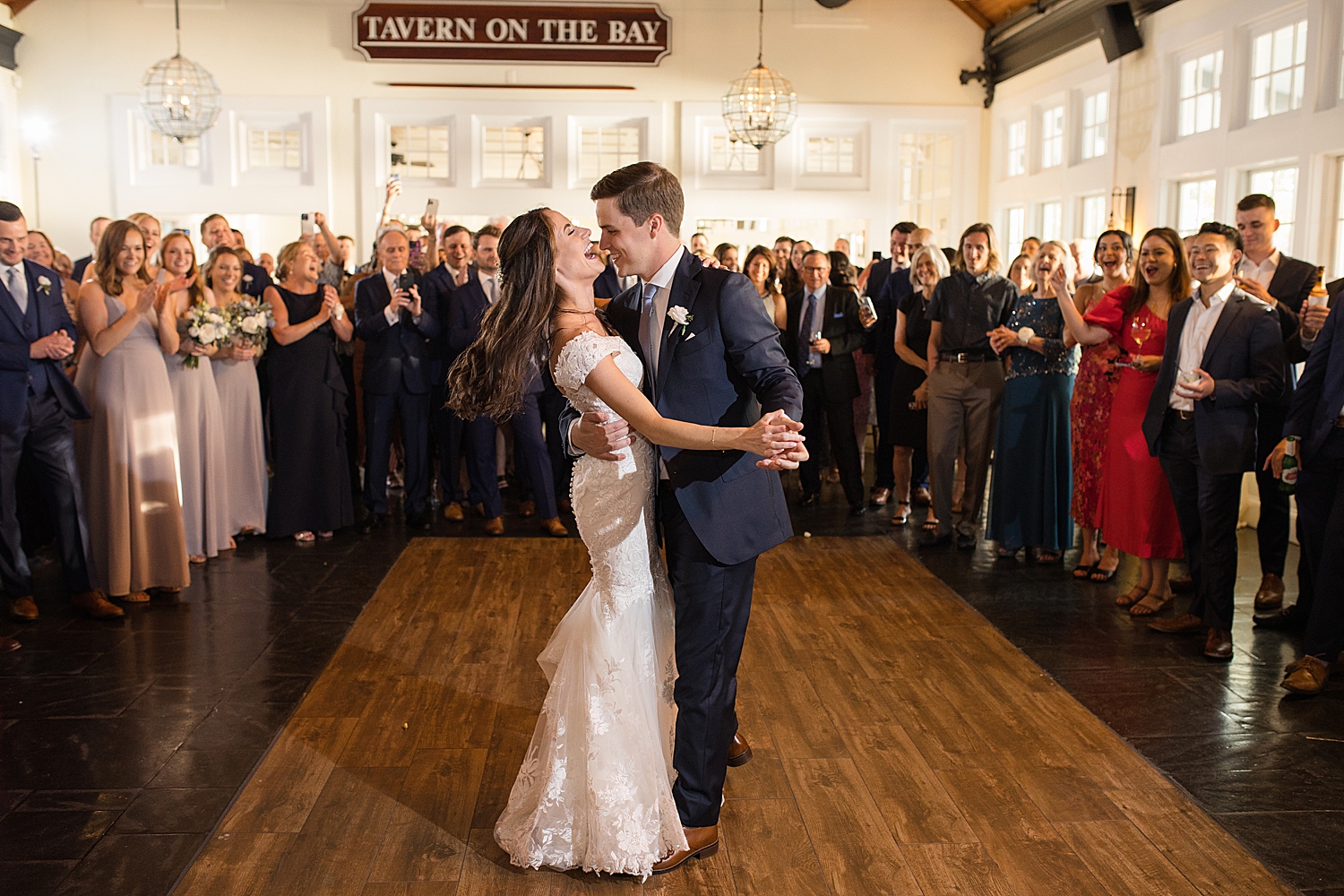 bride and groom laugh during first dance