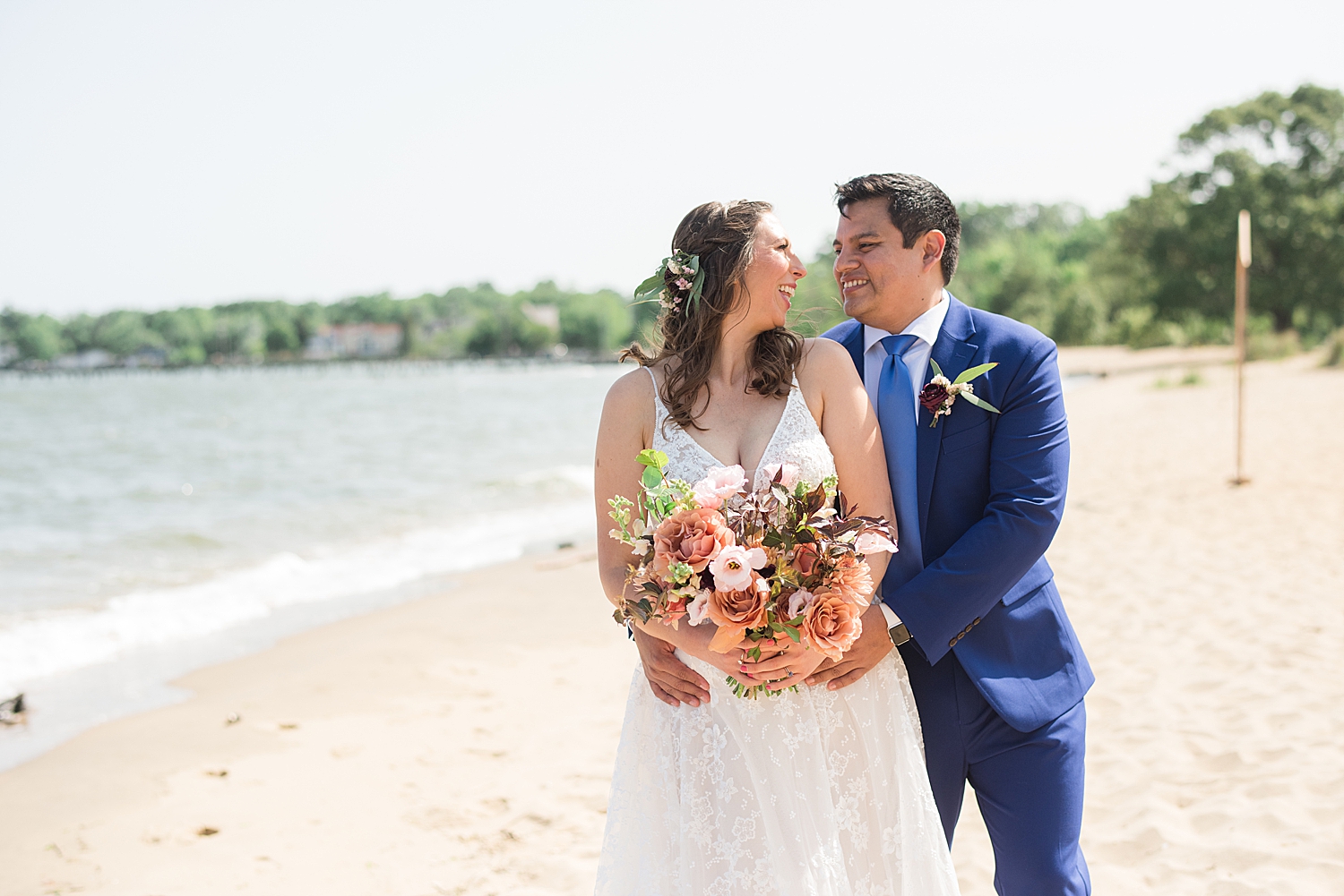 bride and groom portrait on beach