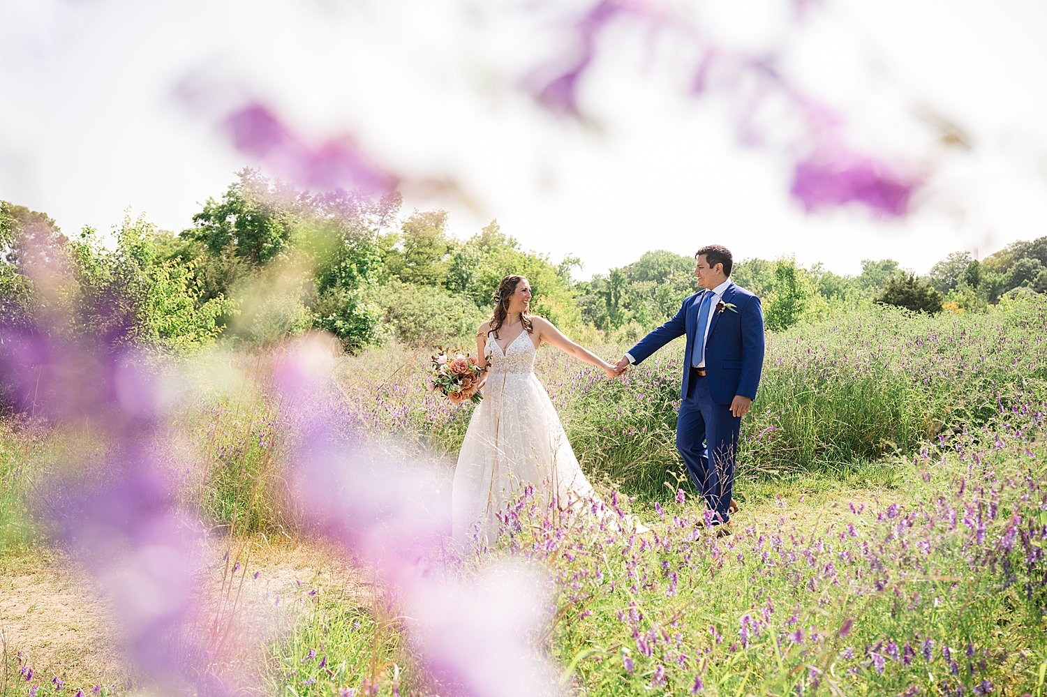 bride and groom portrait through flowers