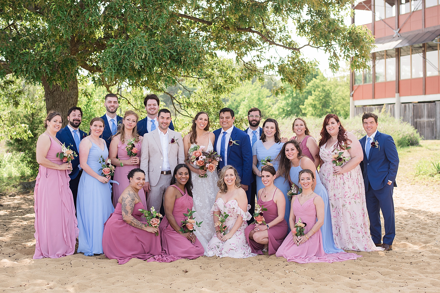 full wedding party on thr beach