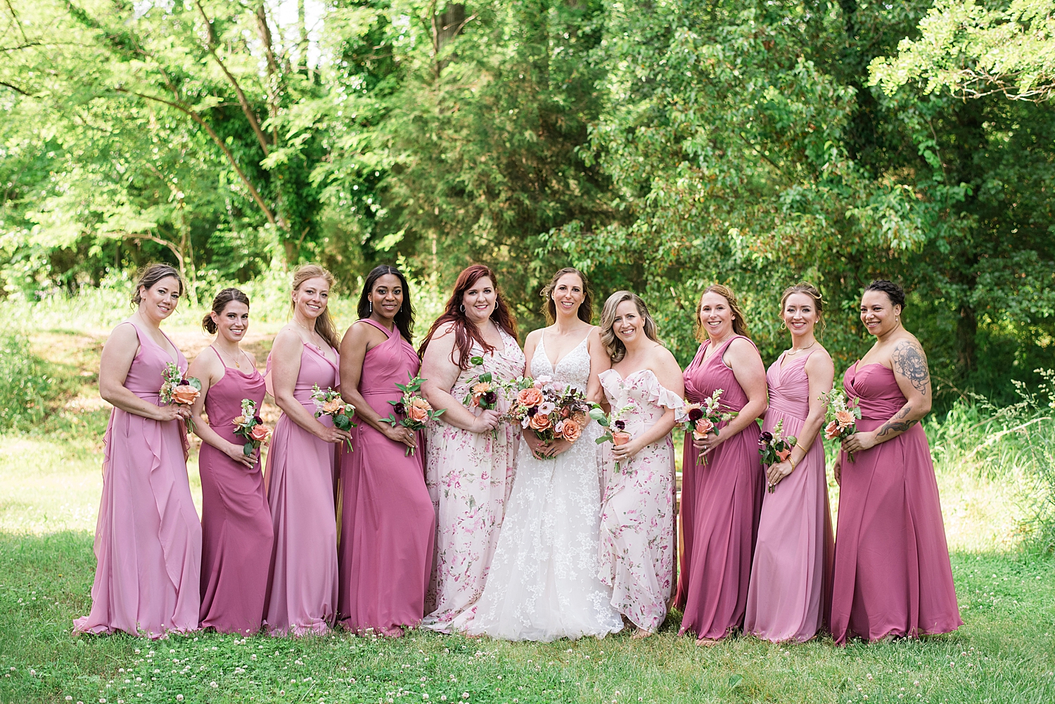 bride's party in pink dresses