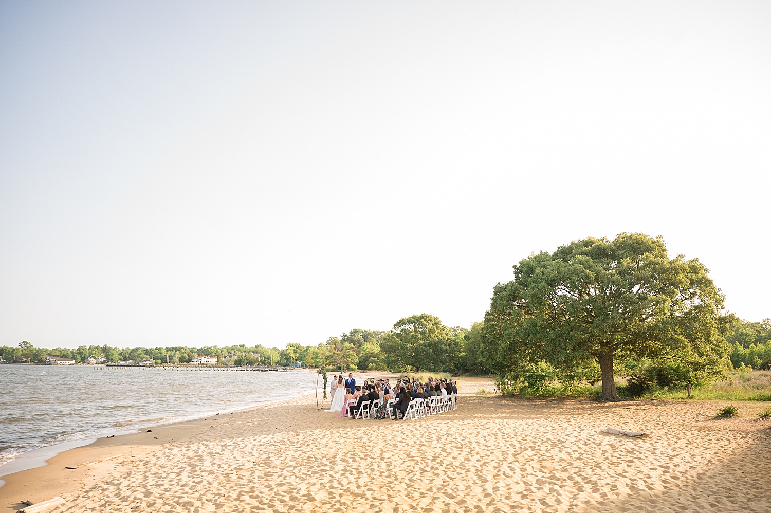 wide shot ceremony on the beach