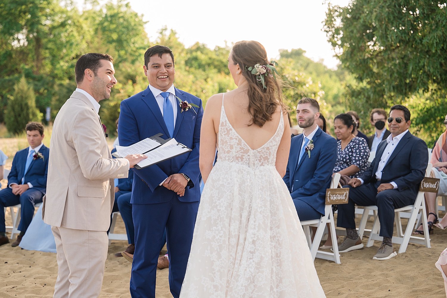 groom smiling during wedding ceremony