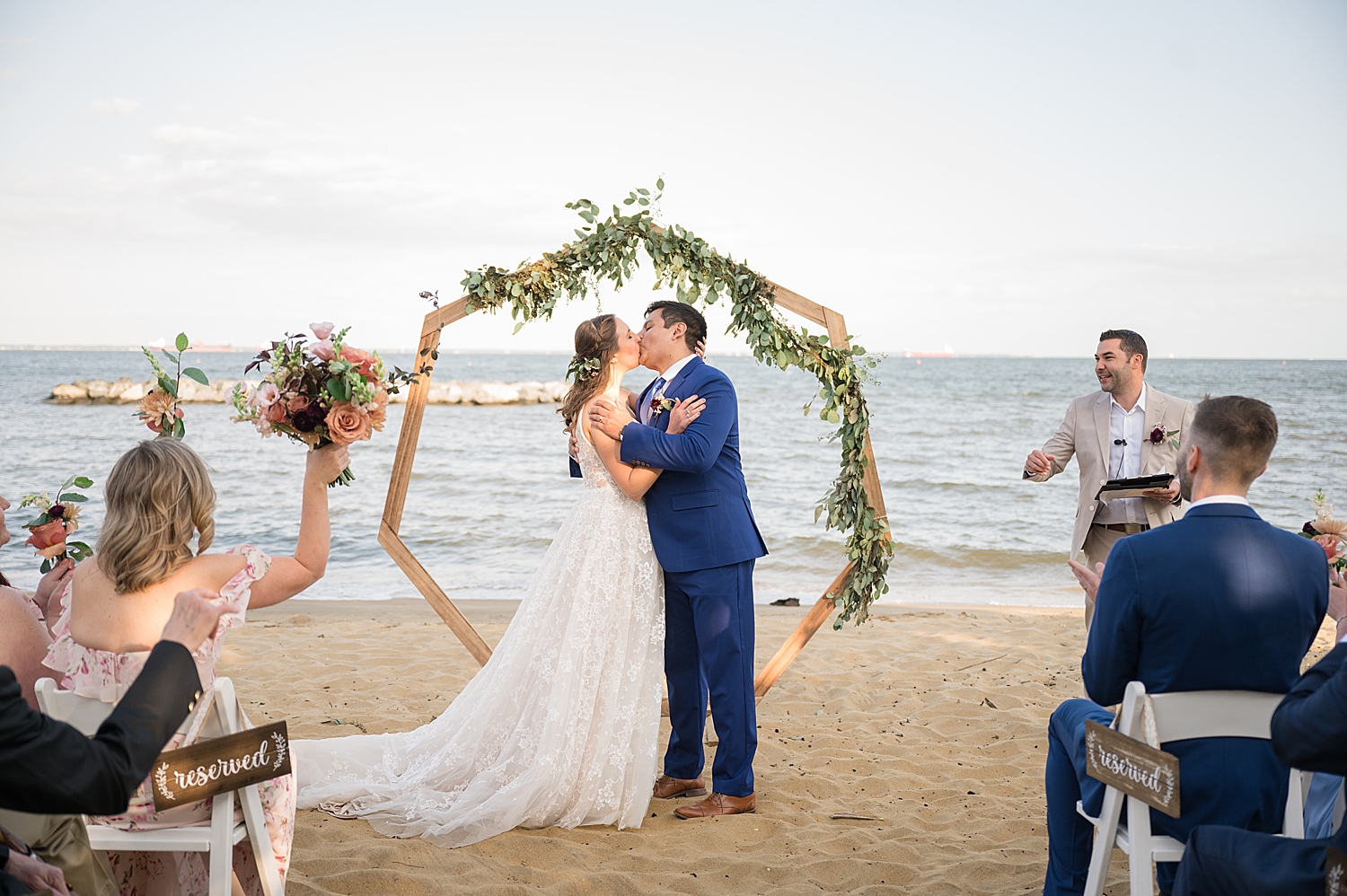 bride and groom first kiss