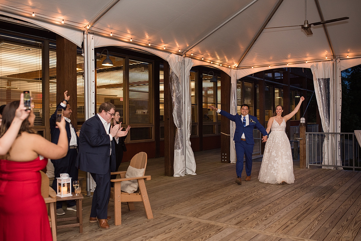 bride and groom enter reception