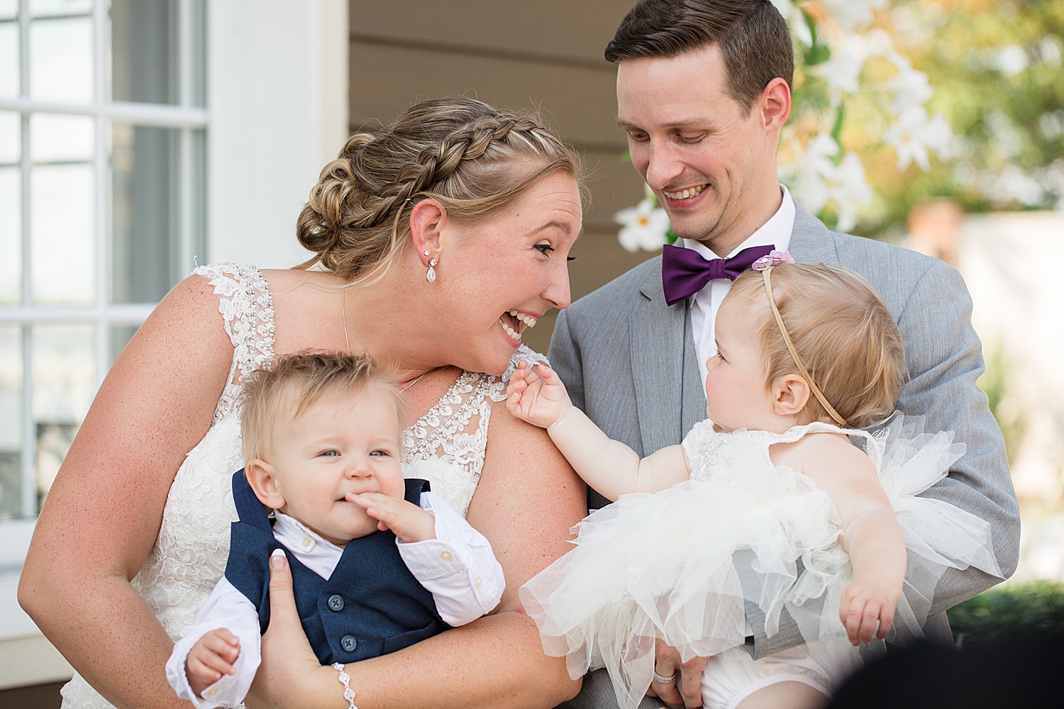 bride and groom with kids