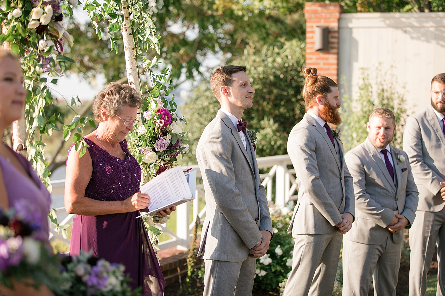 groom waits for bride during ceremony