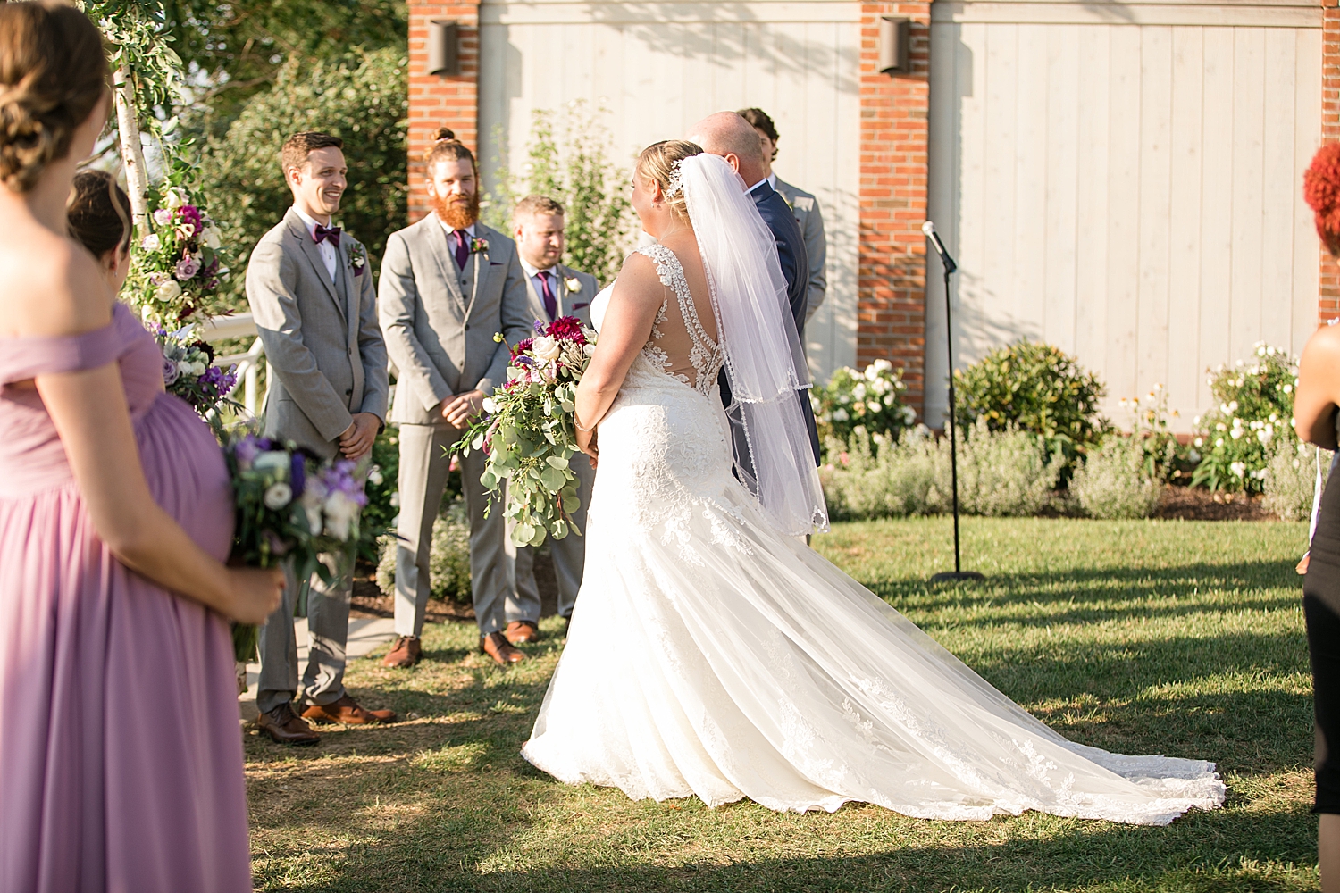 bride walking down aisle with dad