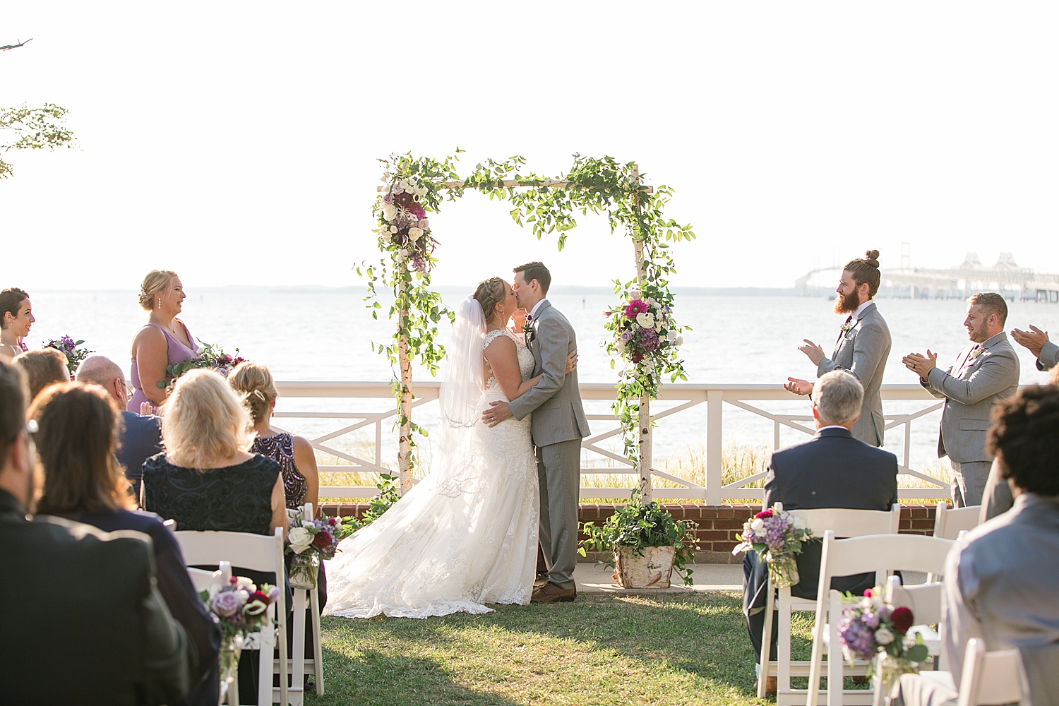 outdoor ceremony on the chesapeake bay, first kiss