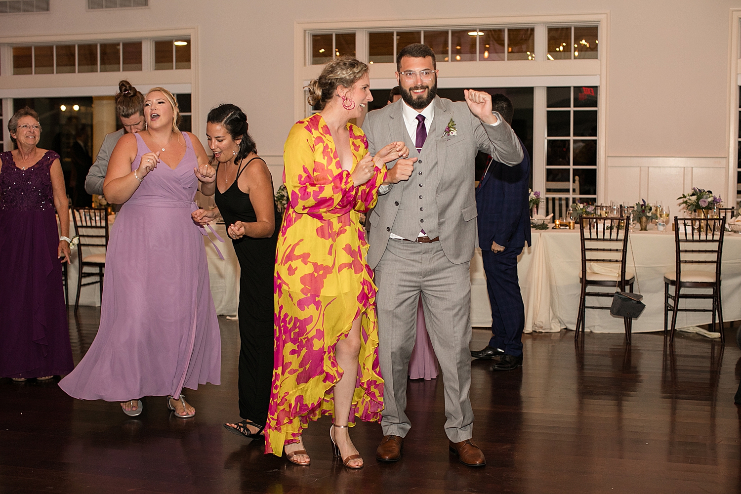 candid guests dancing ballroom