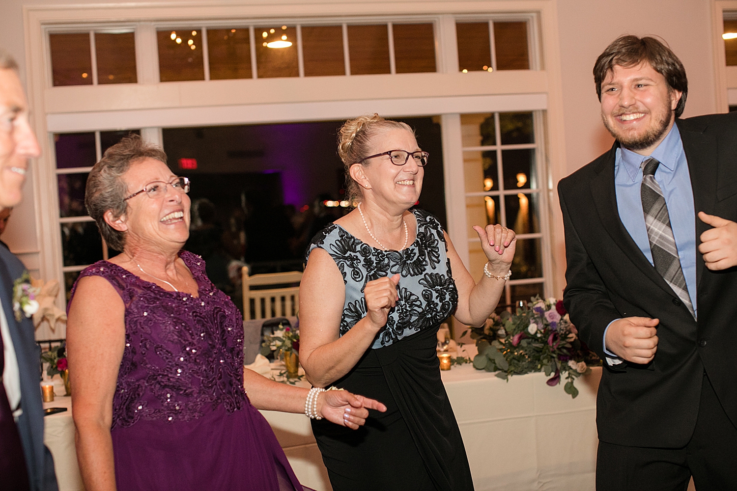 candid guests dancing ballroom