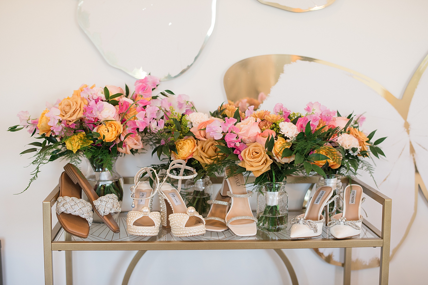 colorful spring wedding florals with bridesmaids shoes