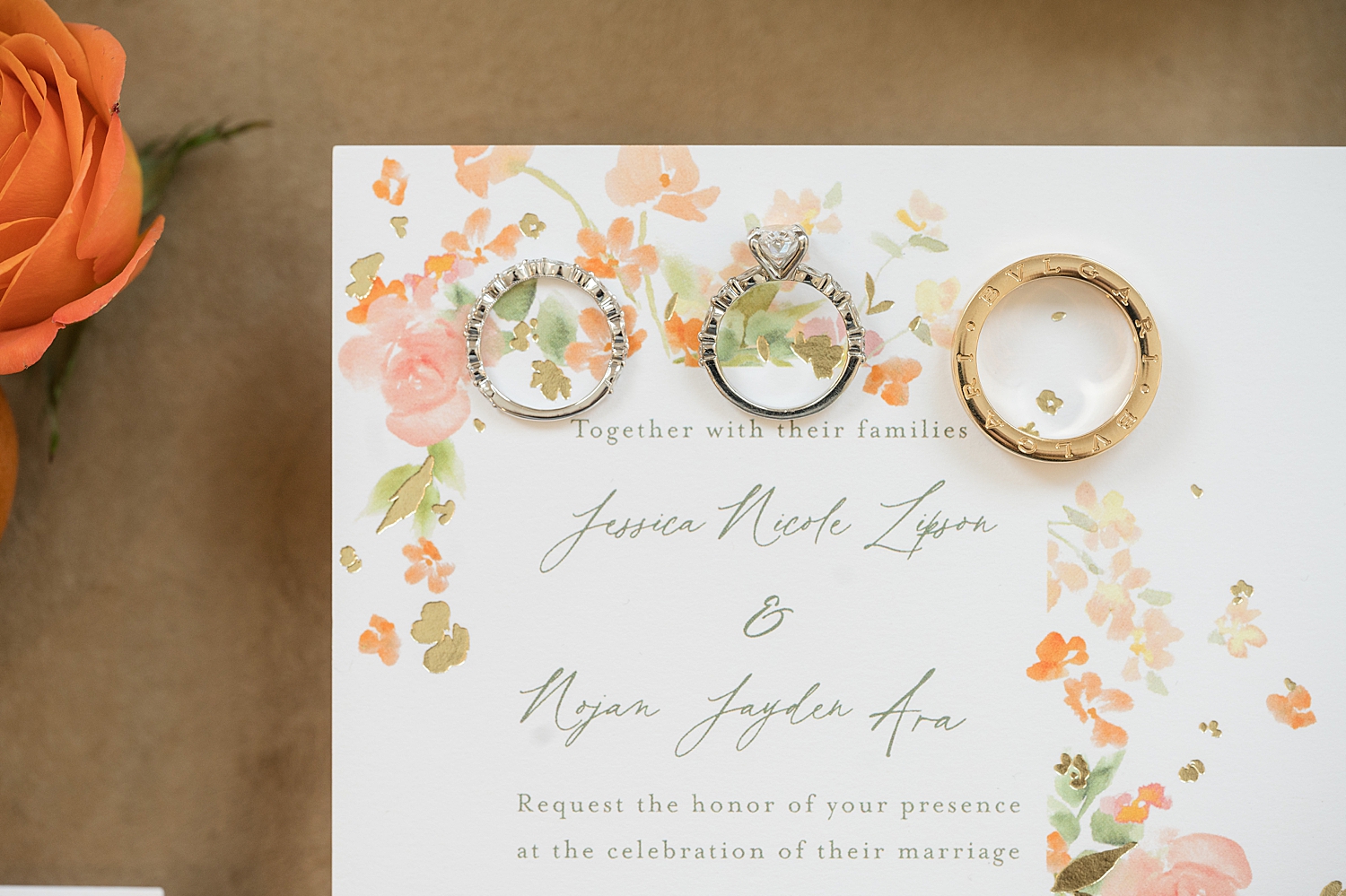 rings on wedding pink invitation