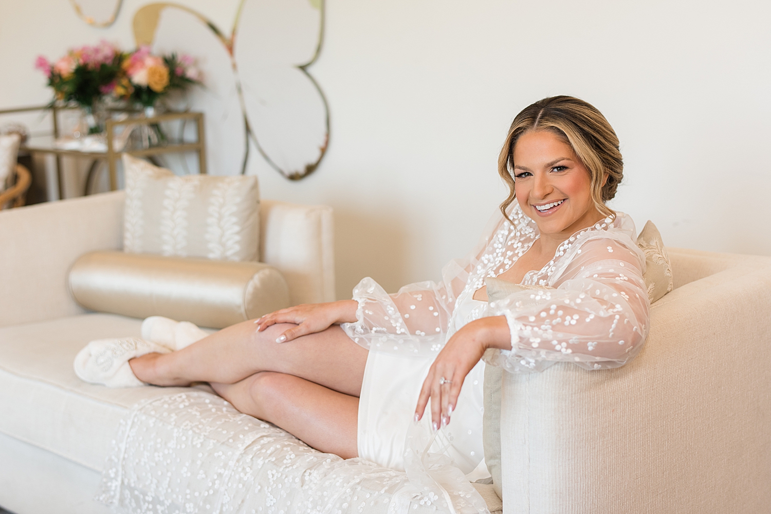 bride lounging on couch in getting ready robe