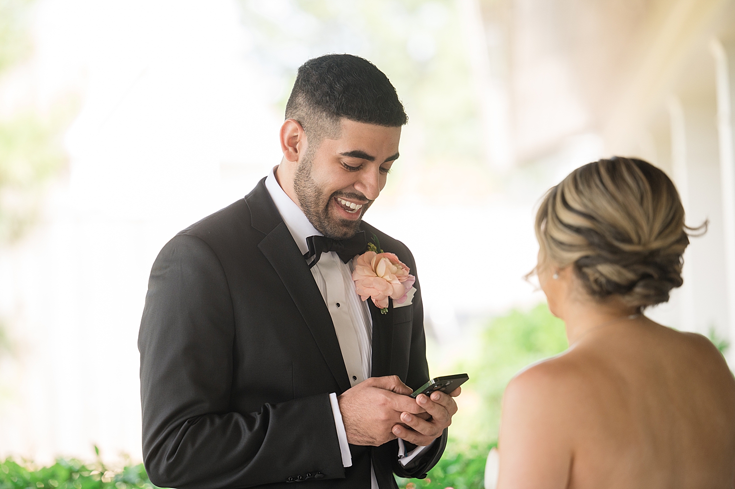 groom reading private vows to bride