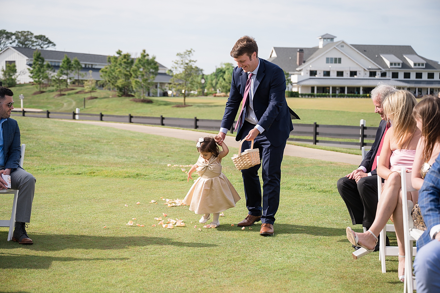 flower girl starting down the aisle