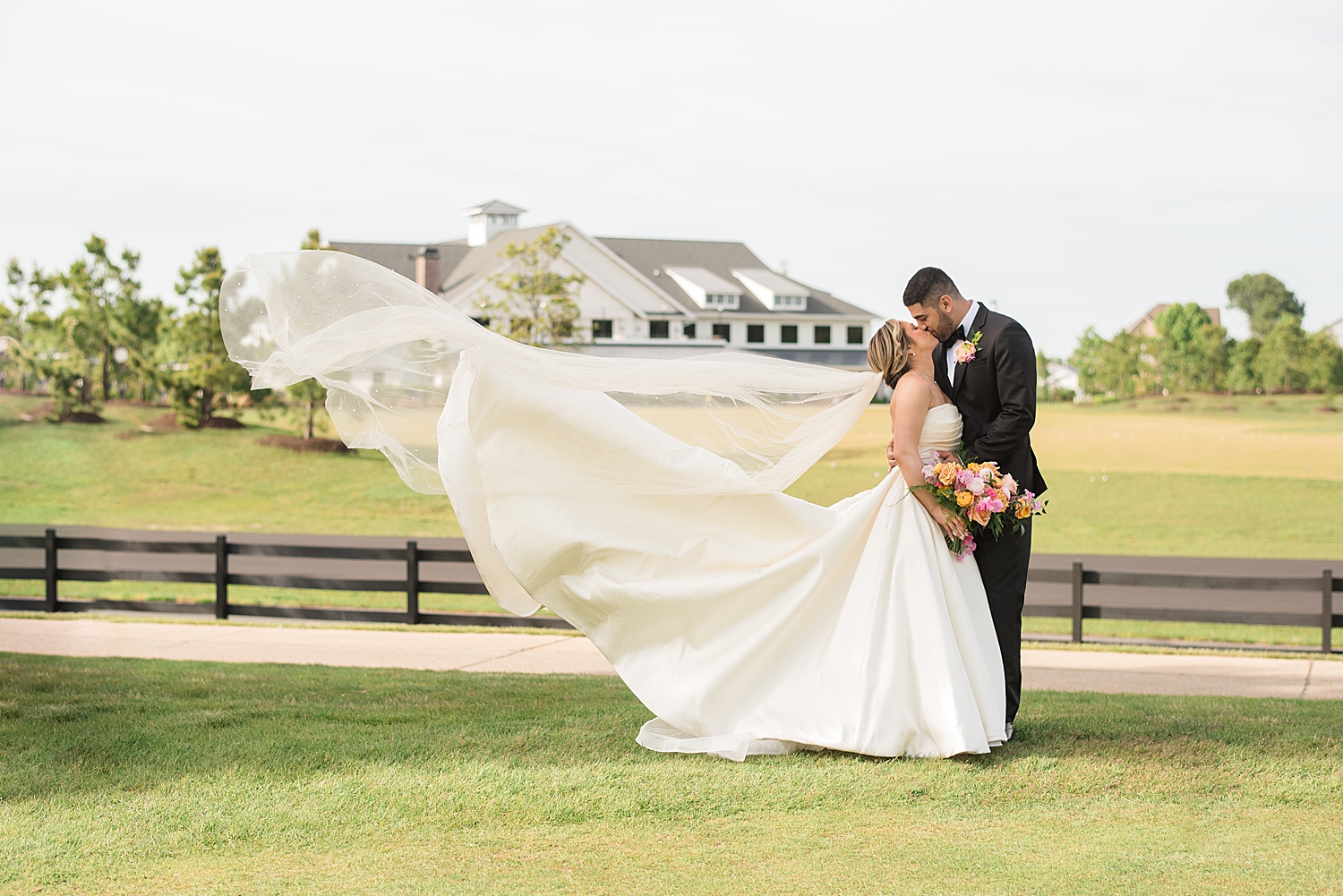 veil toss couple portrait