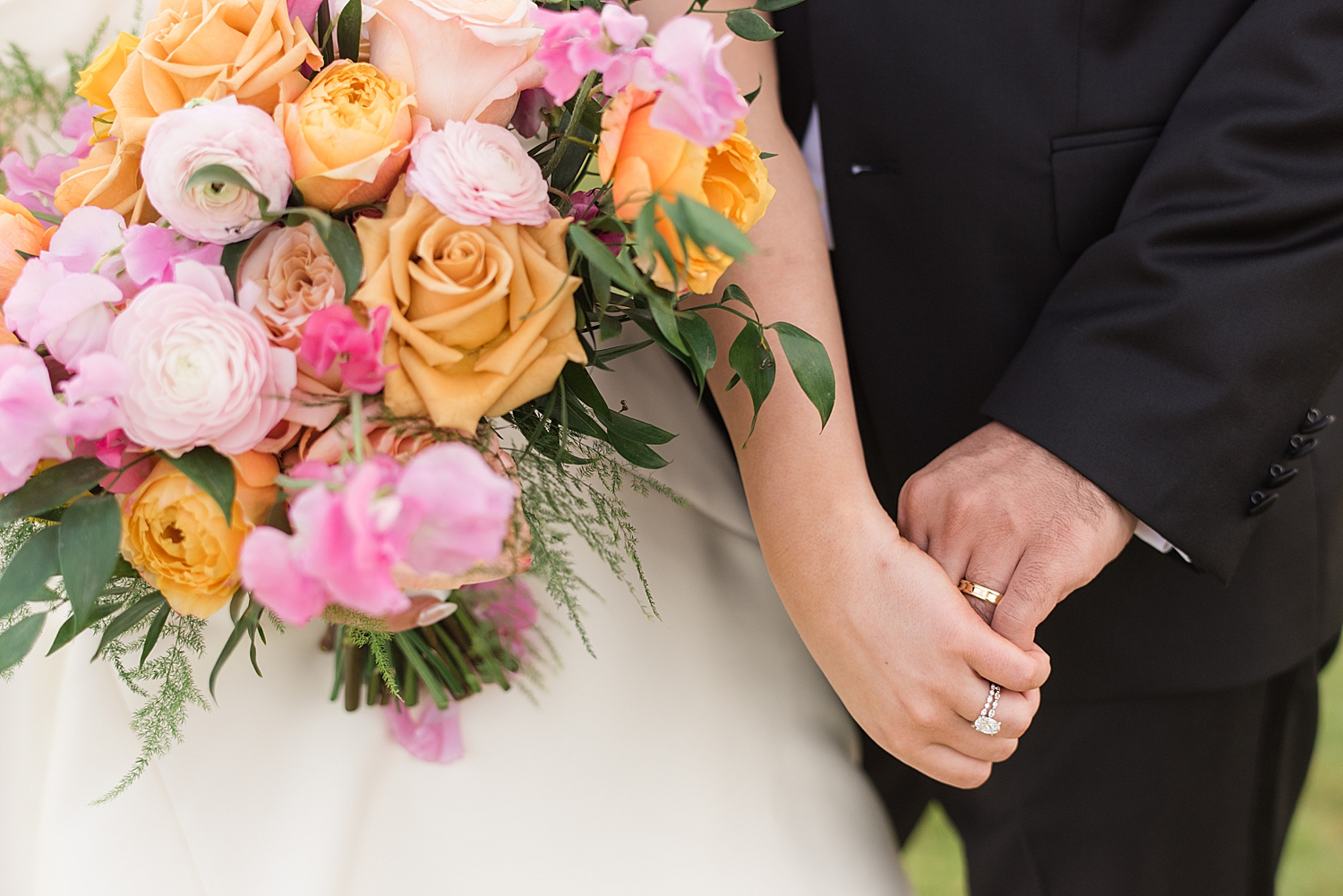 bride and groom holding hands