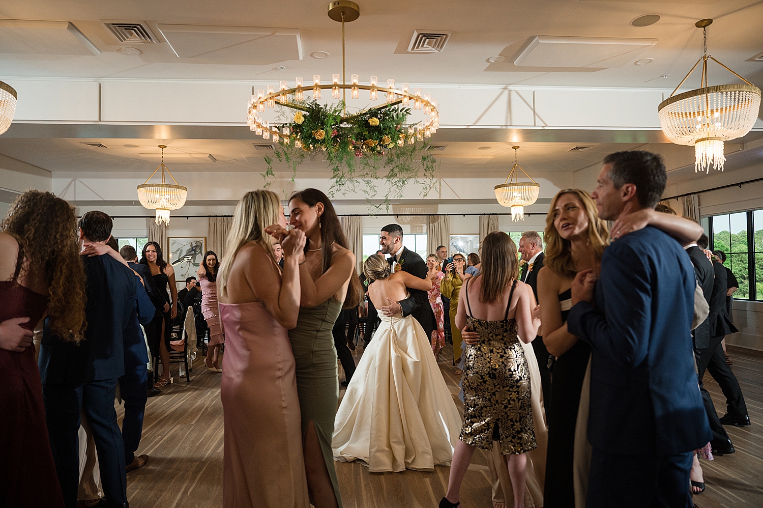 reception candid wedding guests dancing