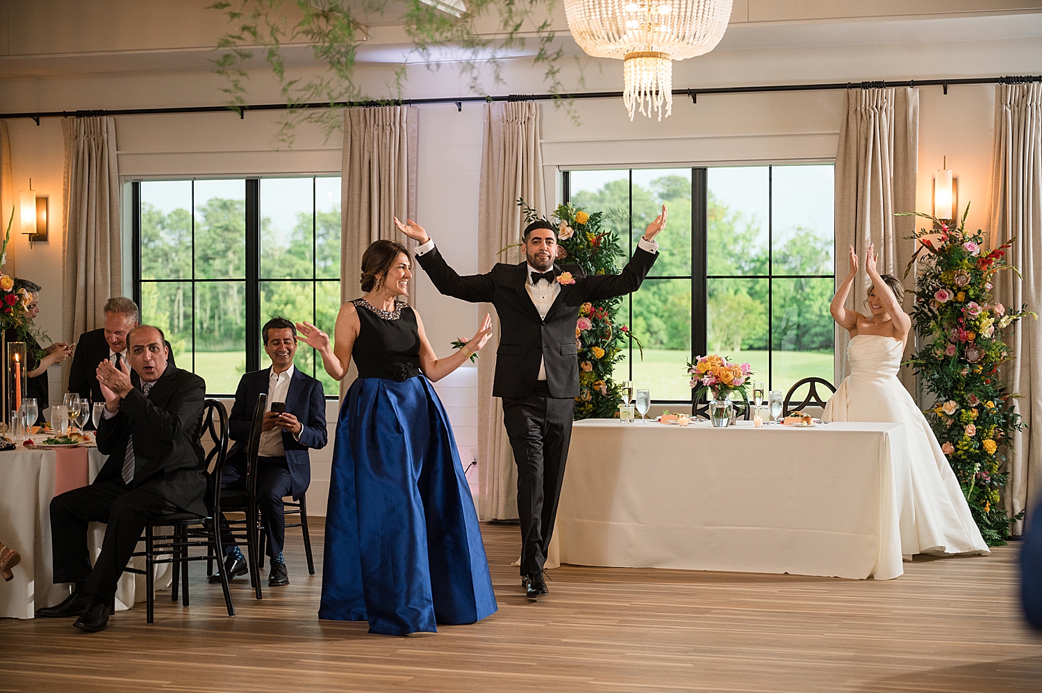 groom dancing with mother