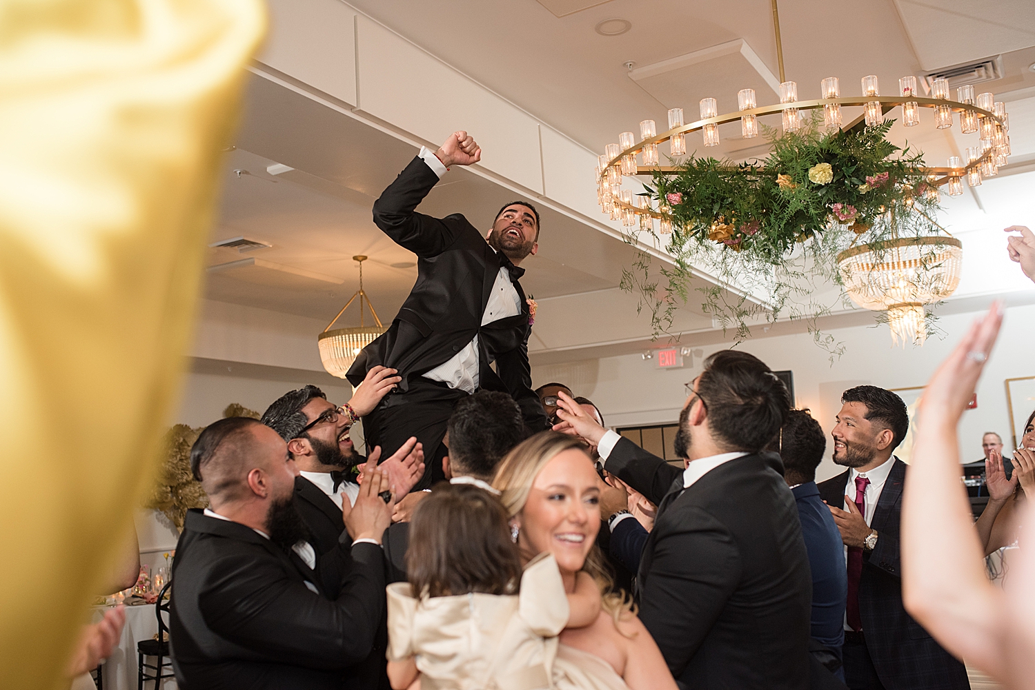 reception candid wedding guests dancing