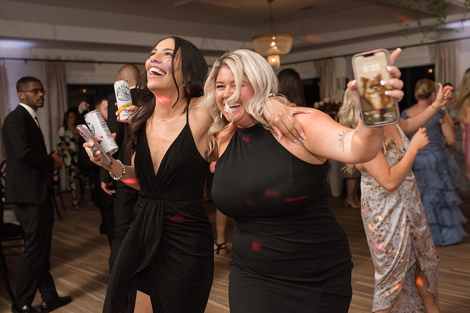 reception candid wedding guests dancing