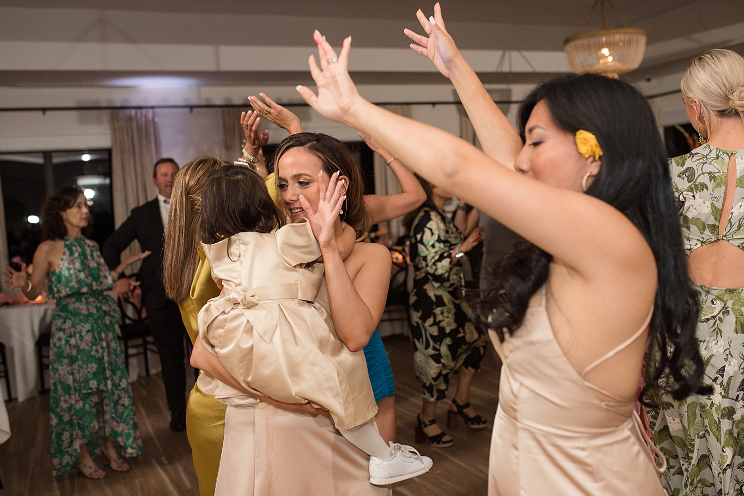 reception candid wedding guests dancing