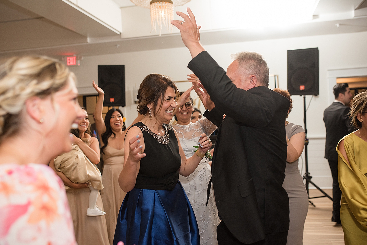 reception candid wedding guests dancing