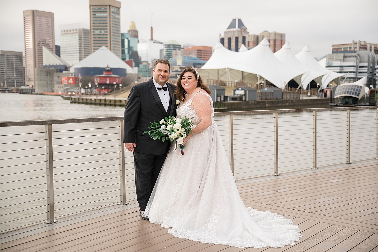 bride and groom portrait on water