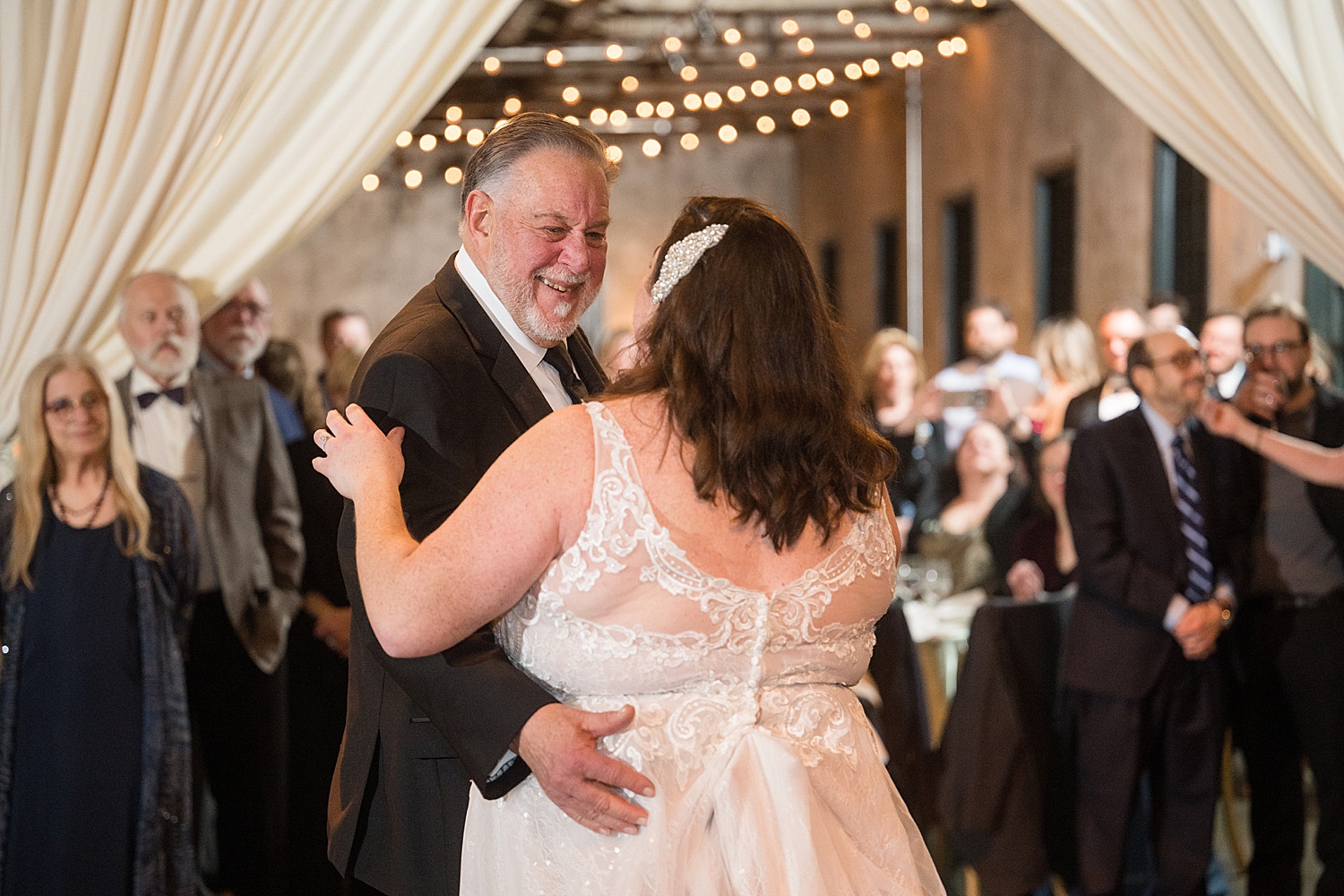 bride dancing with dad