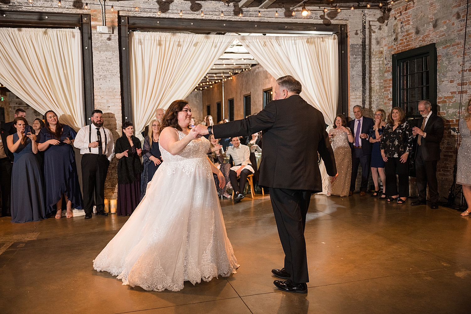 bride dancing with dad