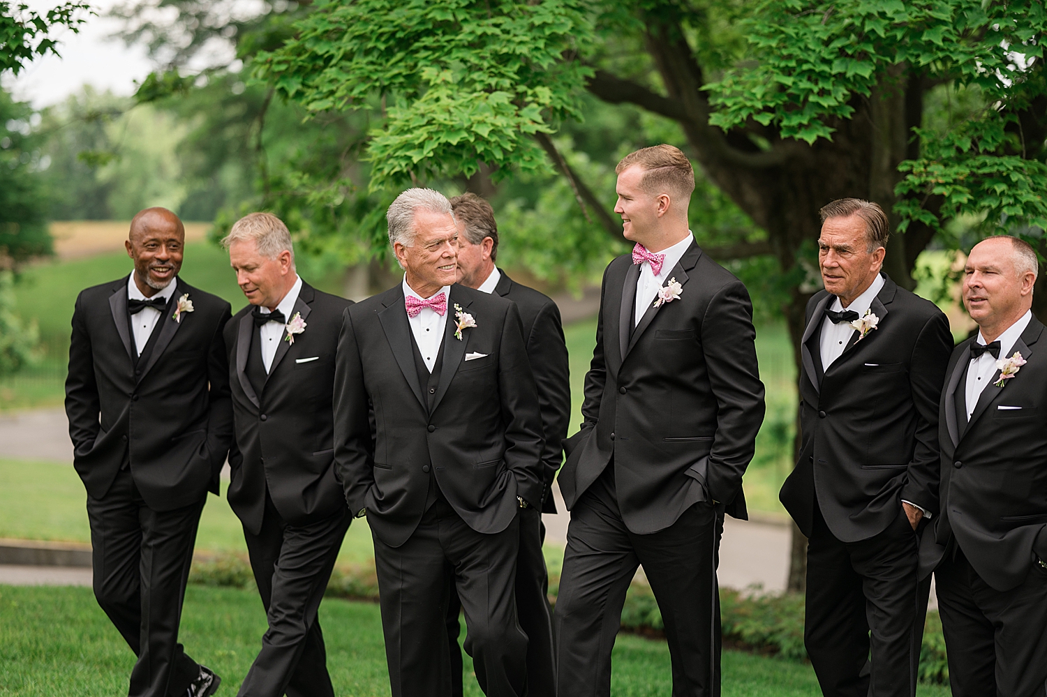 groomsmen smiling and walking