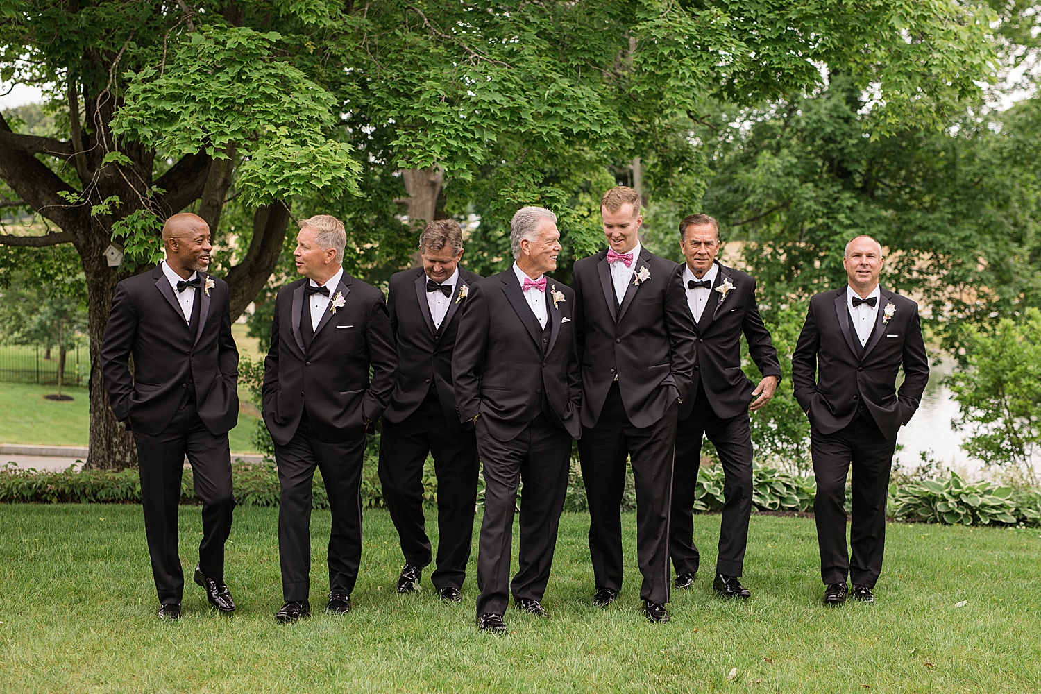 groomsmen smiling and walking