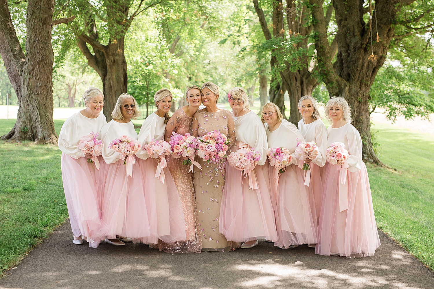  bridesmaids portrait, girls in pink embracing