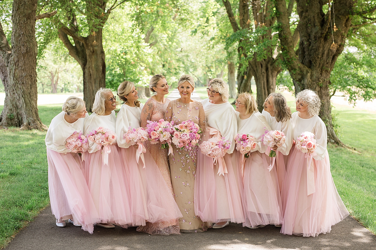  bridesmaids portrait, girls in pink embracing