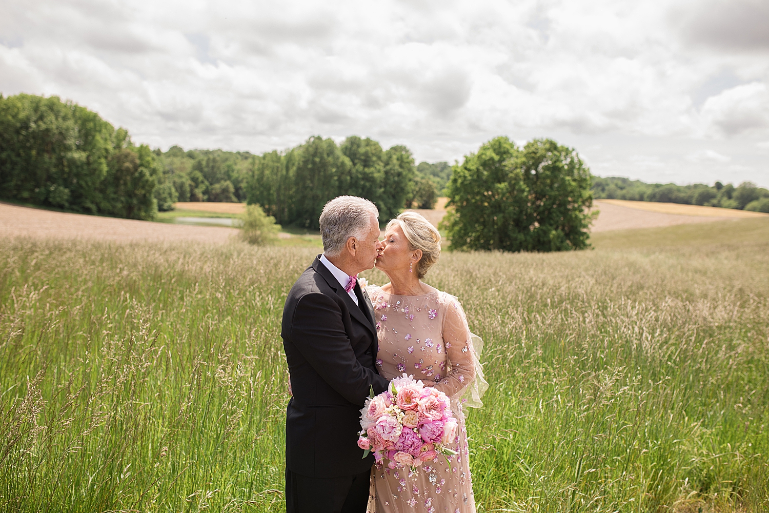 bride and groom portrait, kissing