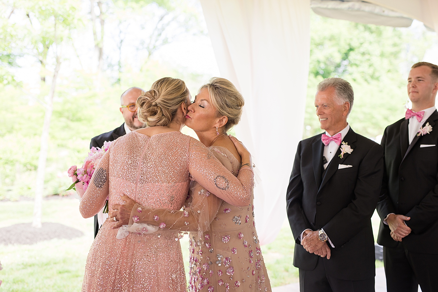 bride and daughter embrace