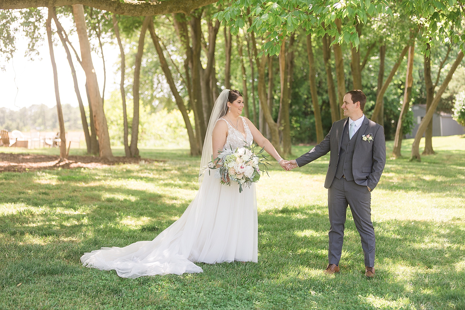 couple portrait in green trees