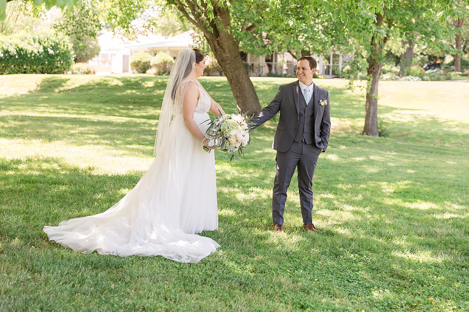 couple portrait in green trees