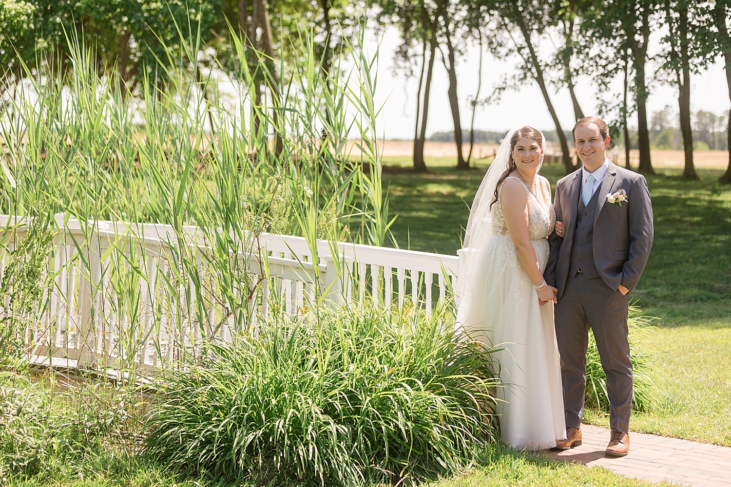 couple portrait in green trees