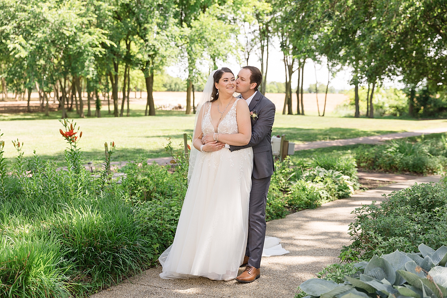 couple portrait in green trees