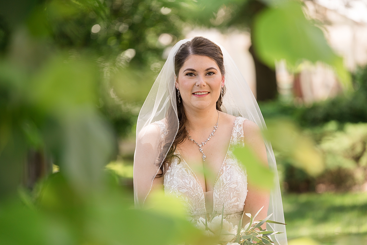 bridal portrait through the trees