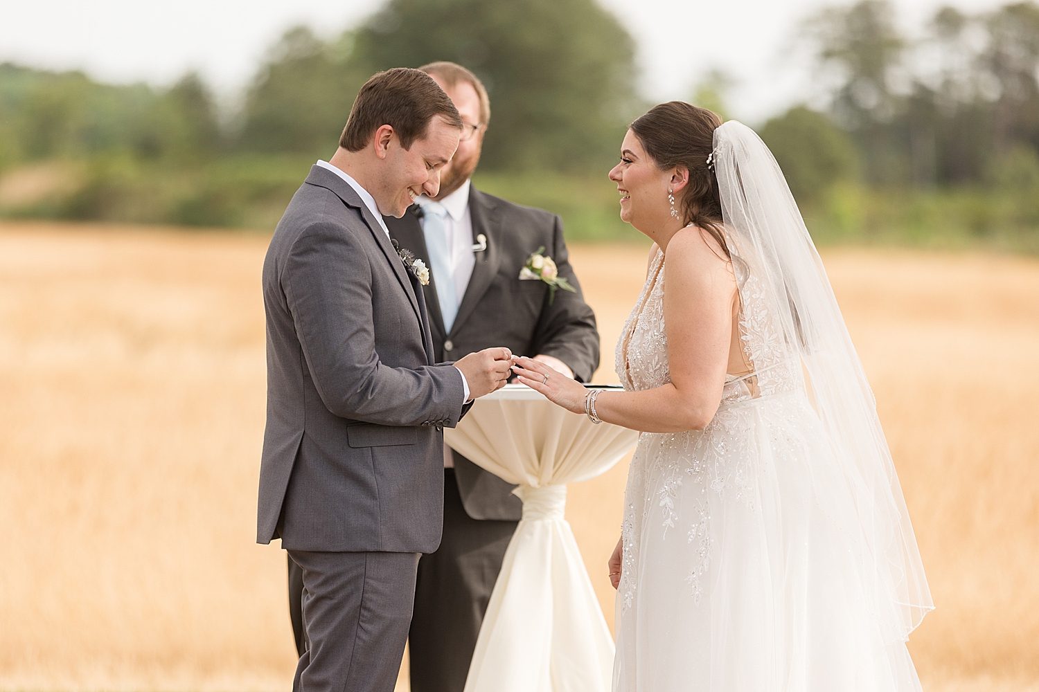 groom and bride exchange rings